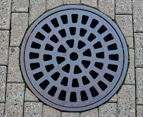How Commercial Drainage Services Keep Your Business Afloat